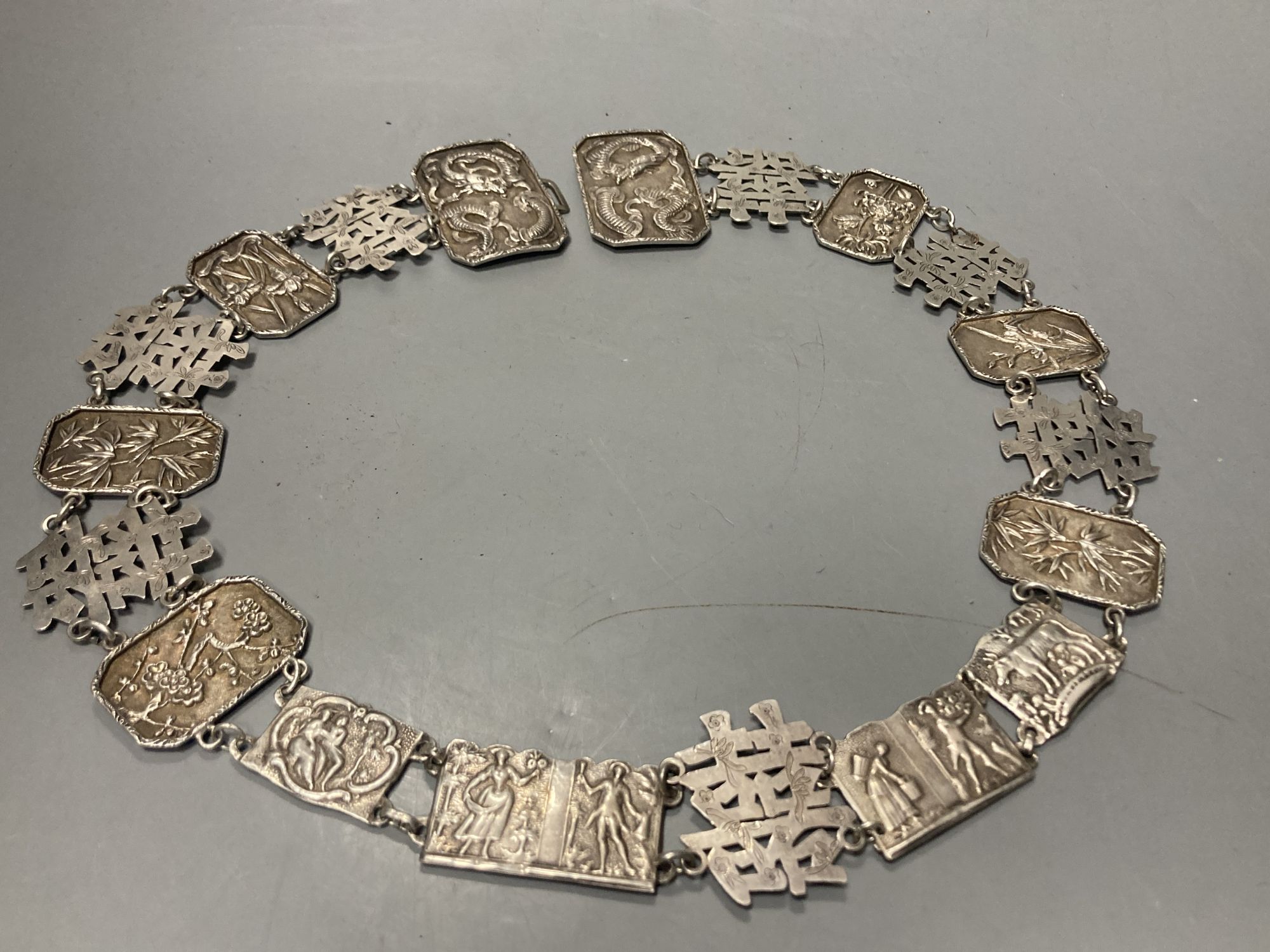 A late 19th century Chinese white metal wedding belt, by Cumwo, 83.5cm, 197 grams.